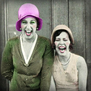 1920s Flapper Girls, laughing together